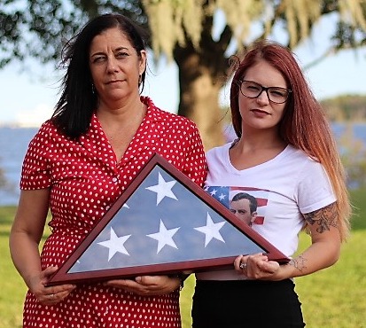 Women Holding American Flag